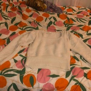 White fuzzy sweater